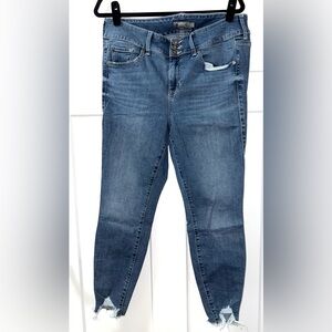 Torrid Jeggings with distressed ankle detail